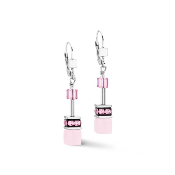 a pair of earrings with pink stones