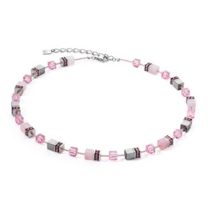 a necklace with pink and silver beads