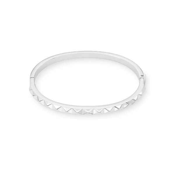 a silver bracelet with a pointed design