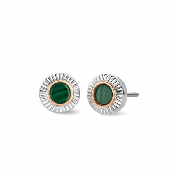 a pair of earrings with a green stone in the middle