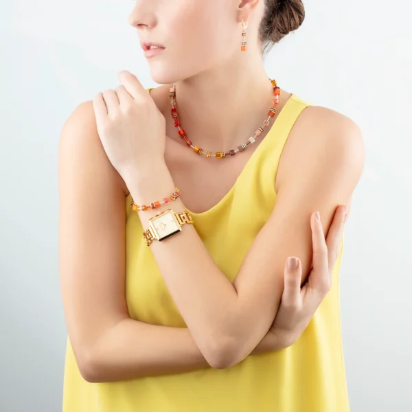 a woman in a yellow shirt